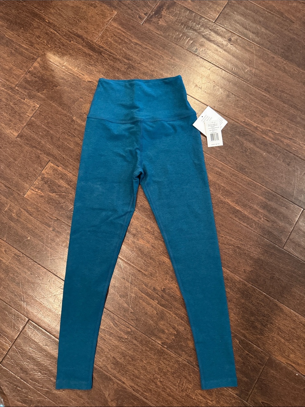 Beyond Yoga Spacedye Caught in the Midi Teal High-Waist Leggings. NWT; small.